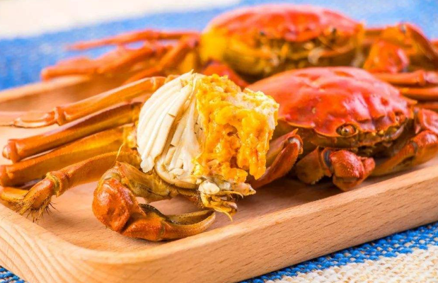 螃蟹和柿子一起吃会怎样？